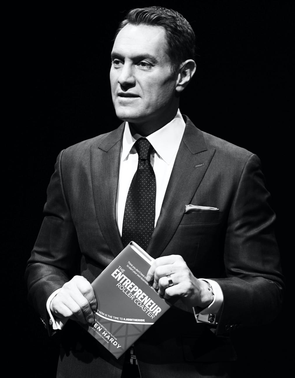 dh-holding-book-new